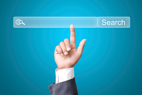 a finger pointing at a search bar to find a b2b seo agency
