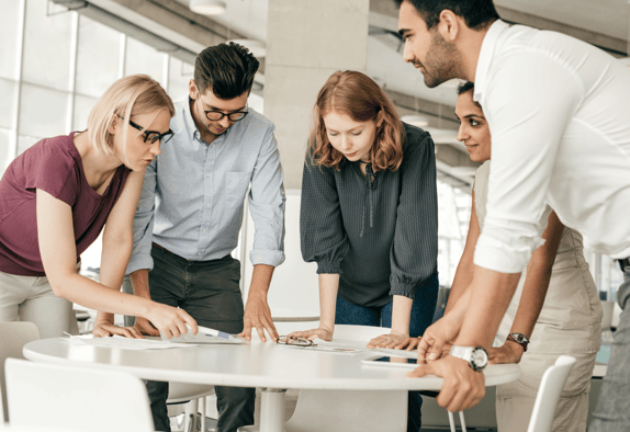 A marketing team reviewing their B2B content marketing strategy