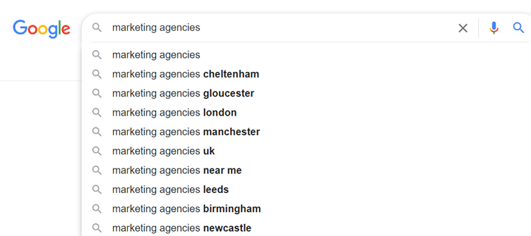 A screenshot of the Google Search bar with the keyword “marketing agencies.”