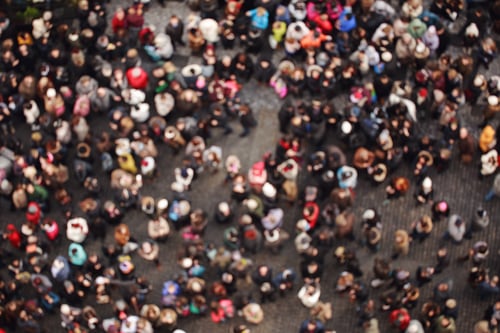 Crowds of people from a birdseye view to represent content mapping