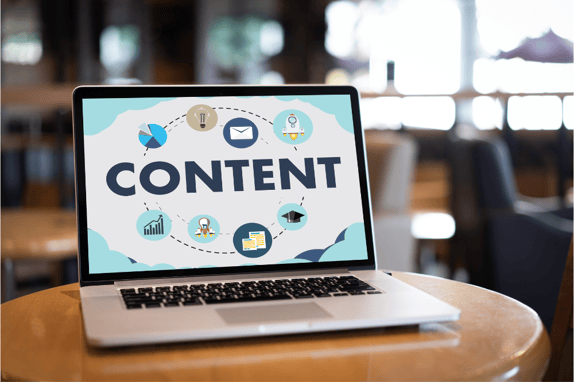 a laptop showing the top content marketing assets