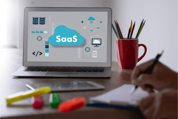 man looking at saas inbound marketing on a laptop screen