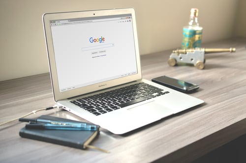 Open laptop displaying Google's search page representing keyword strategy